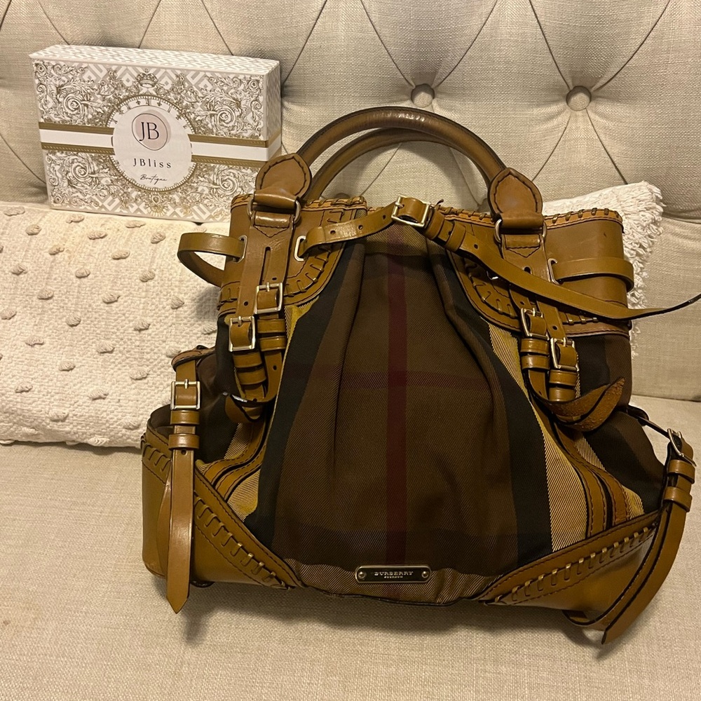 Burberry dark yellow and tan bag in great condition! Highly sought after!